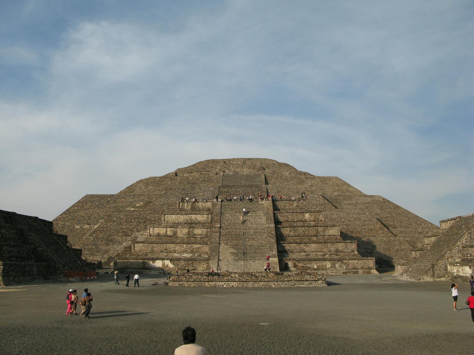 Hotel Booking 13 tourists exploring the ancient pyramid of the